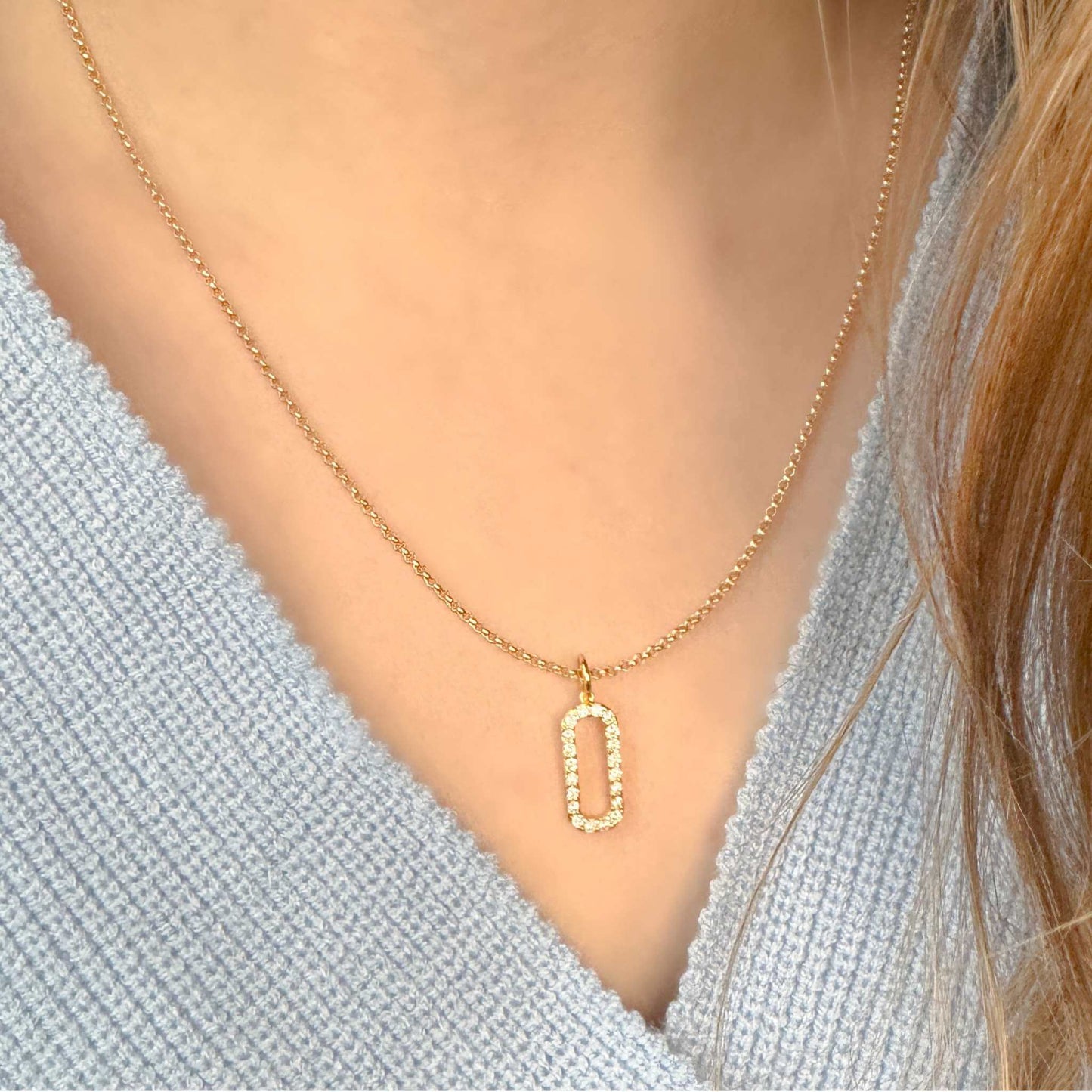 Cassidy CZ Pendant Gold Necklace with small cubic zirconia charm on a delicate 18K gold-filled chain.