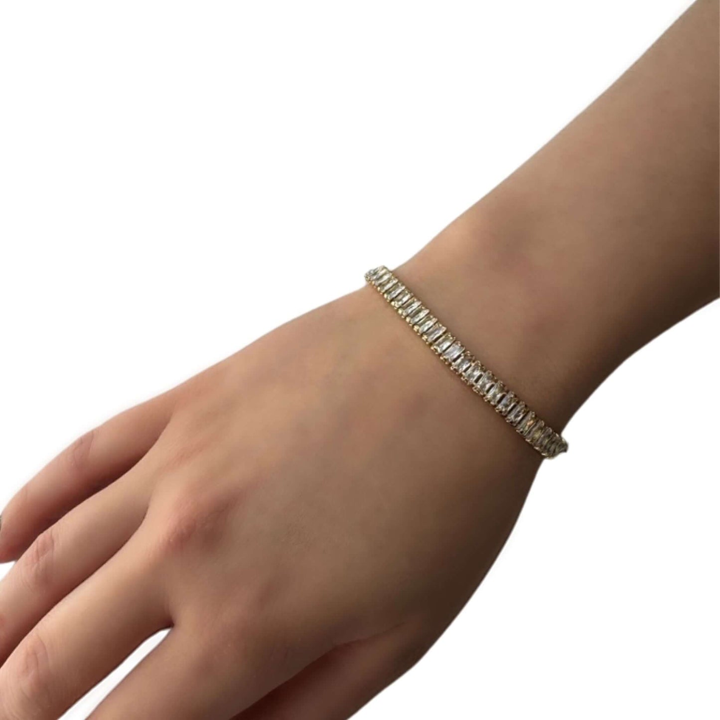 Mila 14K Gold Filled CZ Baguette Paperclip Bracelet worn on a hand, showcasing its elegant design and sparkle.