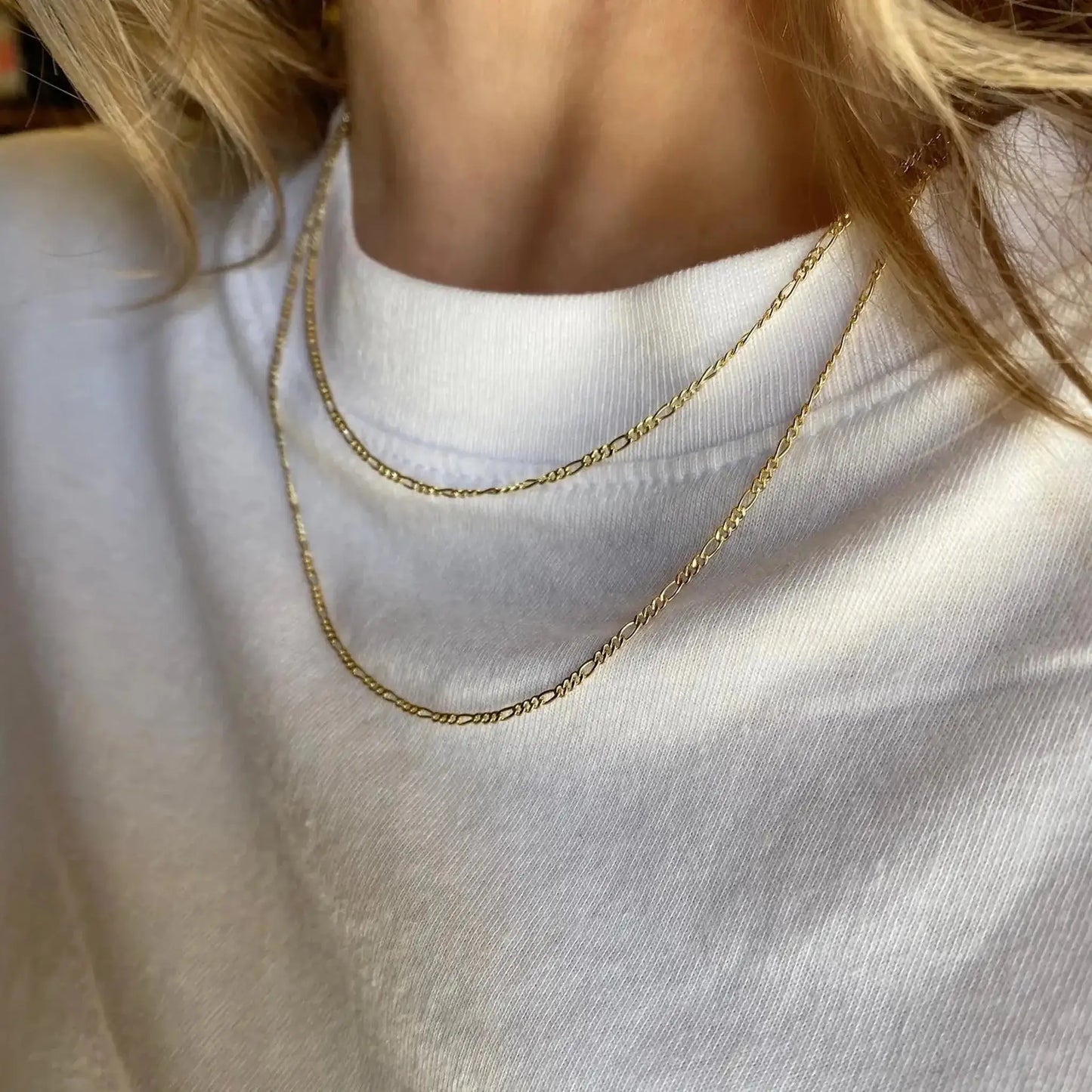 Olive 18K Gold-Filled Delicate Chain Necklace worn gracefully on a white shirt, showcasing its subtle elegance.