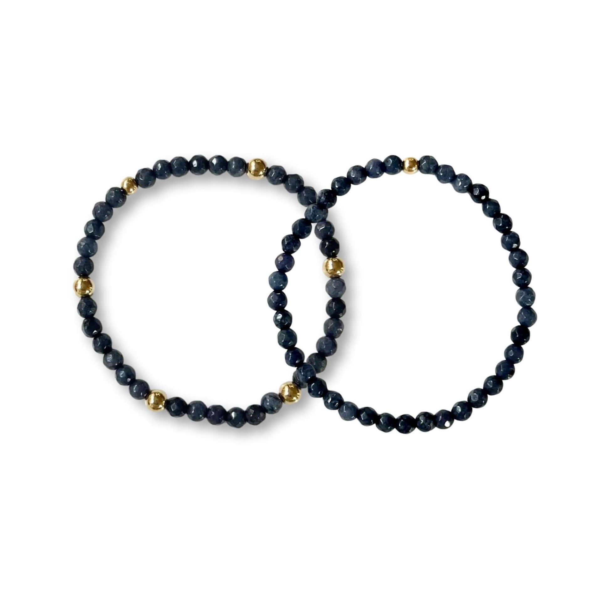 Lucy Navy Blue Stretch Bracelet featuring navy beads and gold-filled accents for a simple yet elegant look.