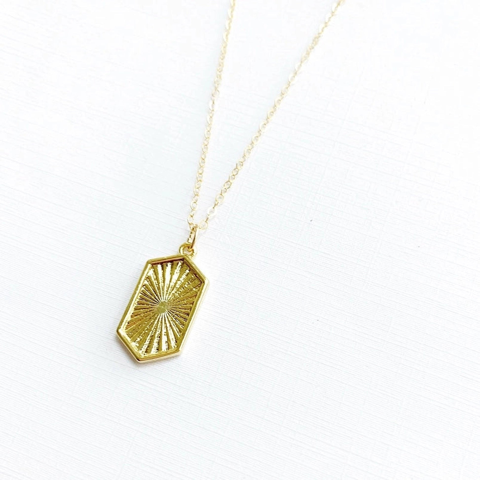 Paige - Malia Grace Jewelry gold starburst pendant necklace